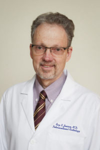 Dr. Ray S. Jensen.