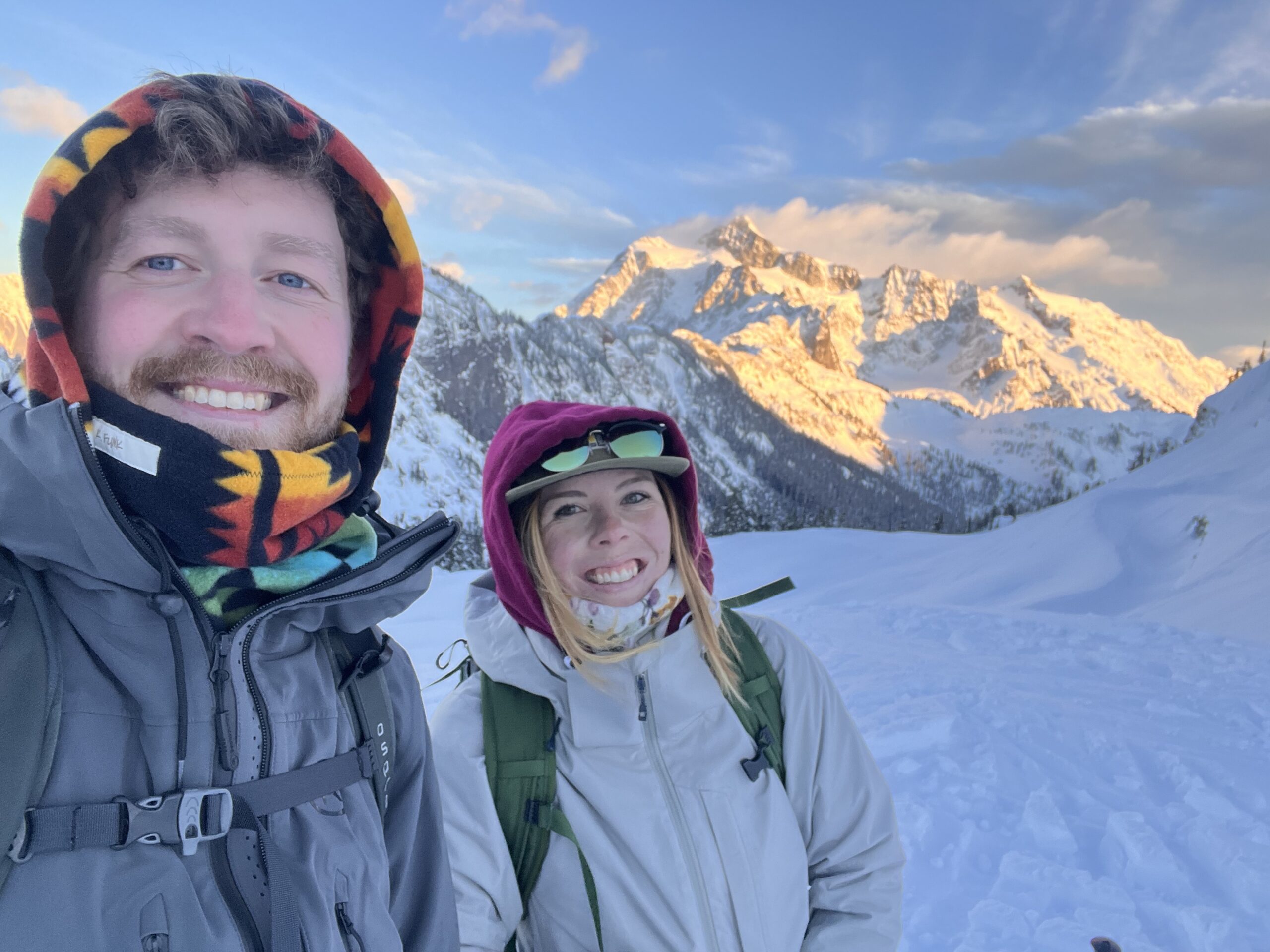 Joseph Hendrickson on top of a mountain with a woman.