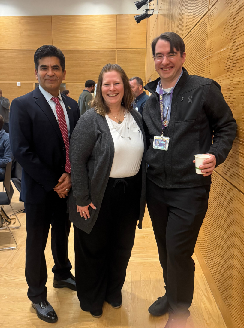 Kris Bakke (center) with Department of Radiology Chair Dushyant Sahani, MD, (left) and Vice Chair of Medical Informatics Nathan Cross, MD, (right) at the UW Distinguished Staff Awards Reception.