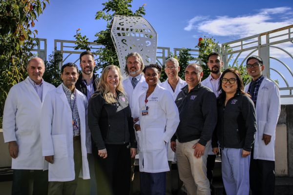 Group in white labcoats